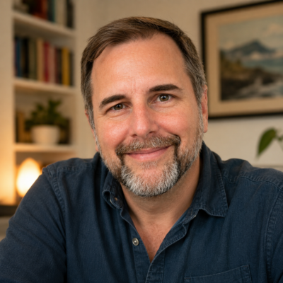 Portrait of Michael Cannon smiling indoors